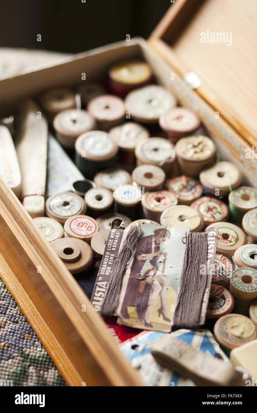Detail of Lady Nuffield's sewing box, full of cotton reels, Nuffield