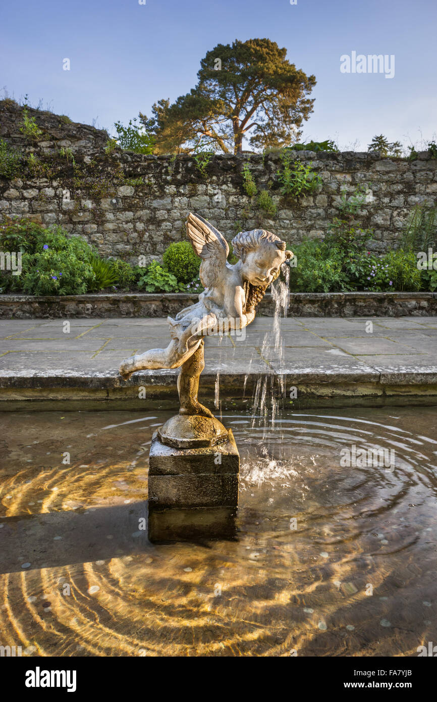 Cherub fountain in the garden at Ightham Mote, Kent Stock Photo Alamy
