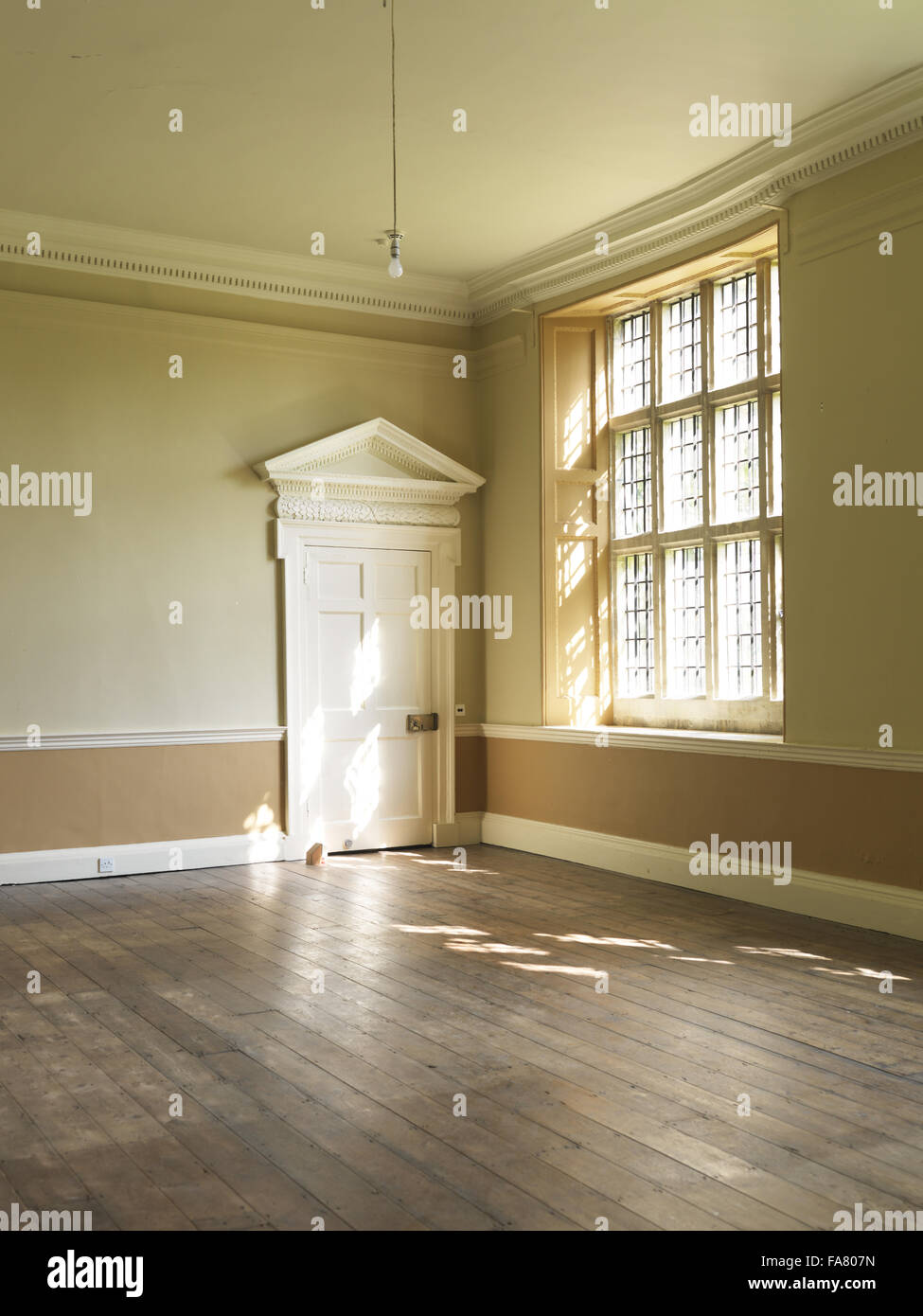 The empty Palladian Dining Room, Avebury Manor, Wiltshire, in April 2011, before its redecoration. This view was taken prior to the BBC filming the transformation of the house, while the rooms were being cleared in preparation. Stock Photo