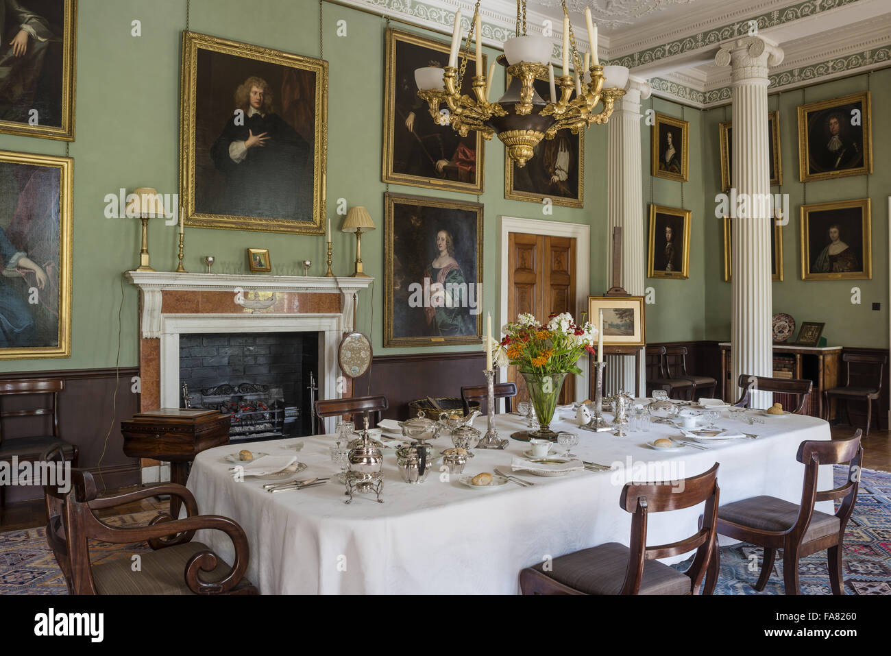 The Dining Room at Killerton, Devon. This room has been the Dining Room at Killerton since the Edwardian period, having originally been designed as the 'Great Parlour'. Stock Photo