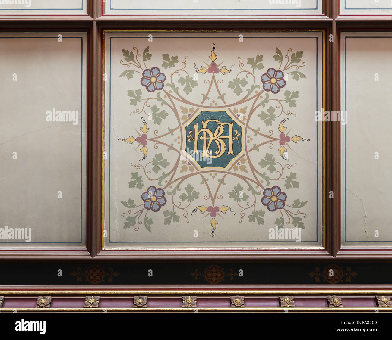 Detail of the decorated ceiling in the West Drawing Room, Oxburgh Hall, Norfolk. Much of the decoration was the work of Sir Henry Paston-Bedingfeld, 7th Bt, and his wife, Augusta Clavering, following their marriage in 1859. Their interlaced initials 'HAB' Stock Photo