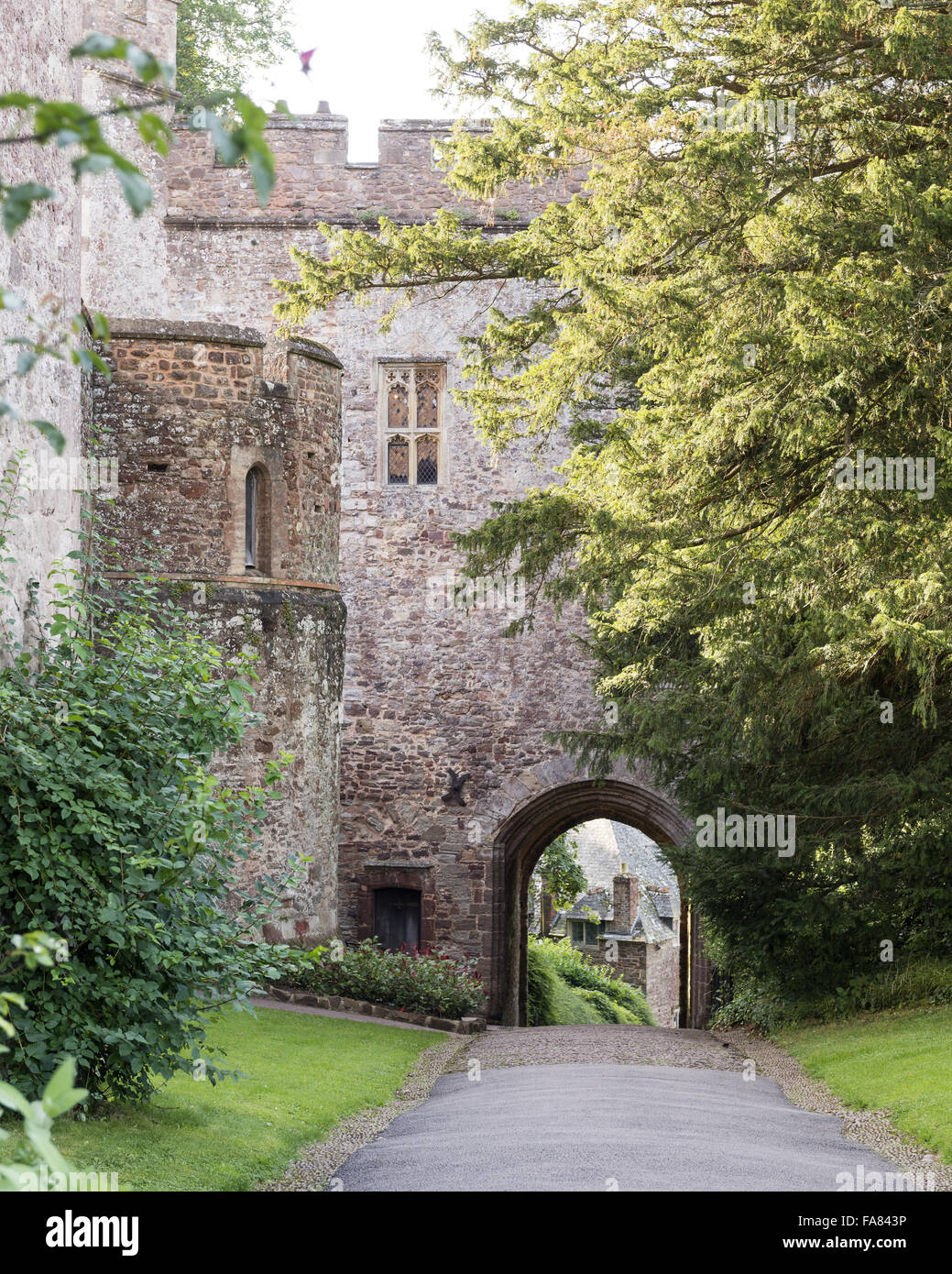 The thirteenth century Gateway at Dunster Castle, Somerset. Stock Photo