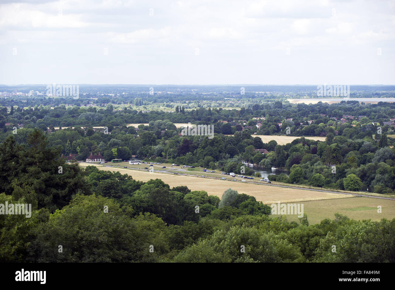 View from an elevated viewpoint of the meadows and Fairhaven Lodges at Runnymede, Surrey. Stock Photo