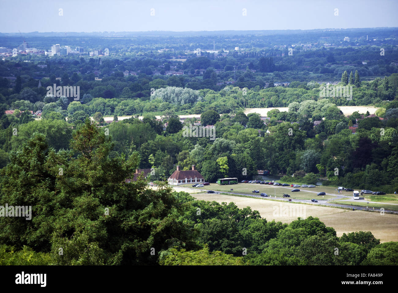 View from an elevated viewpoint of the meadows and Fairhaven Lodges at Runnymede, Surrey. Stock Photo
