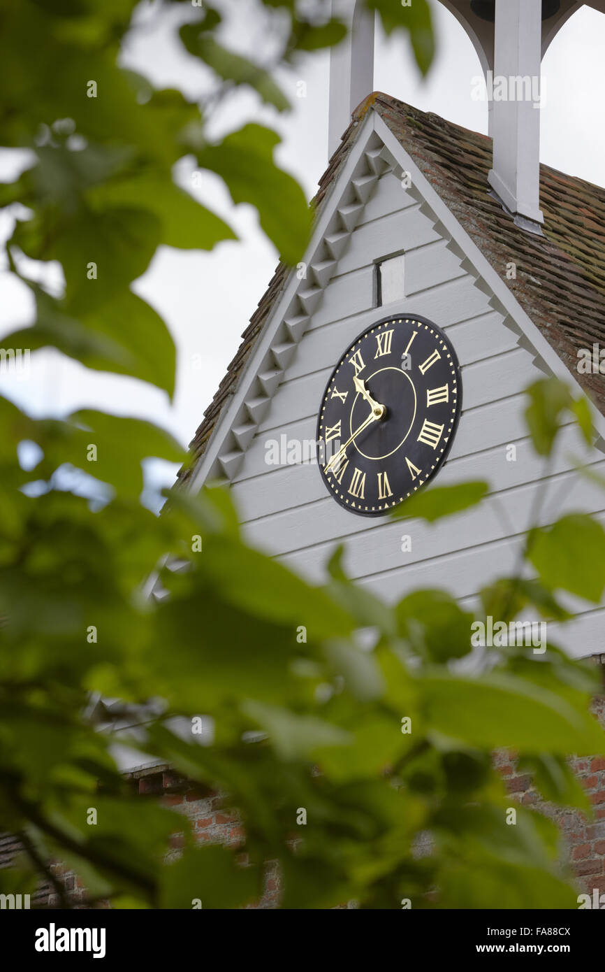 Clock on a building at The Vyne, Hampshire. Stock Photo