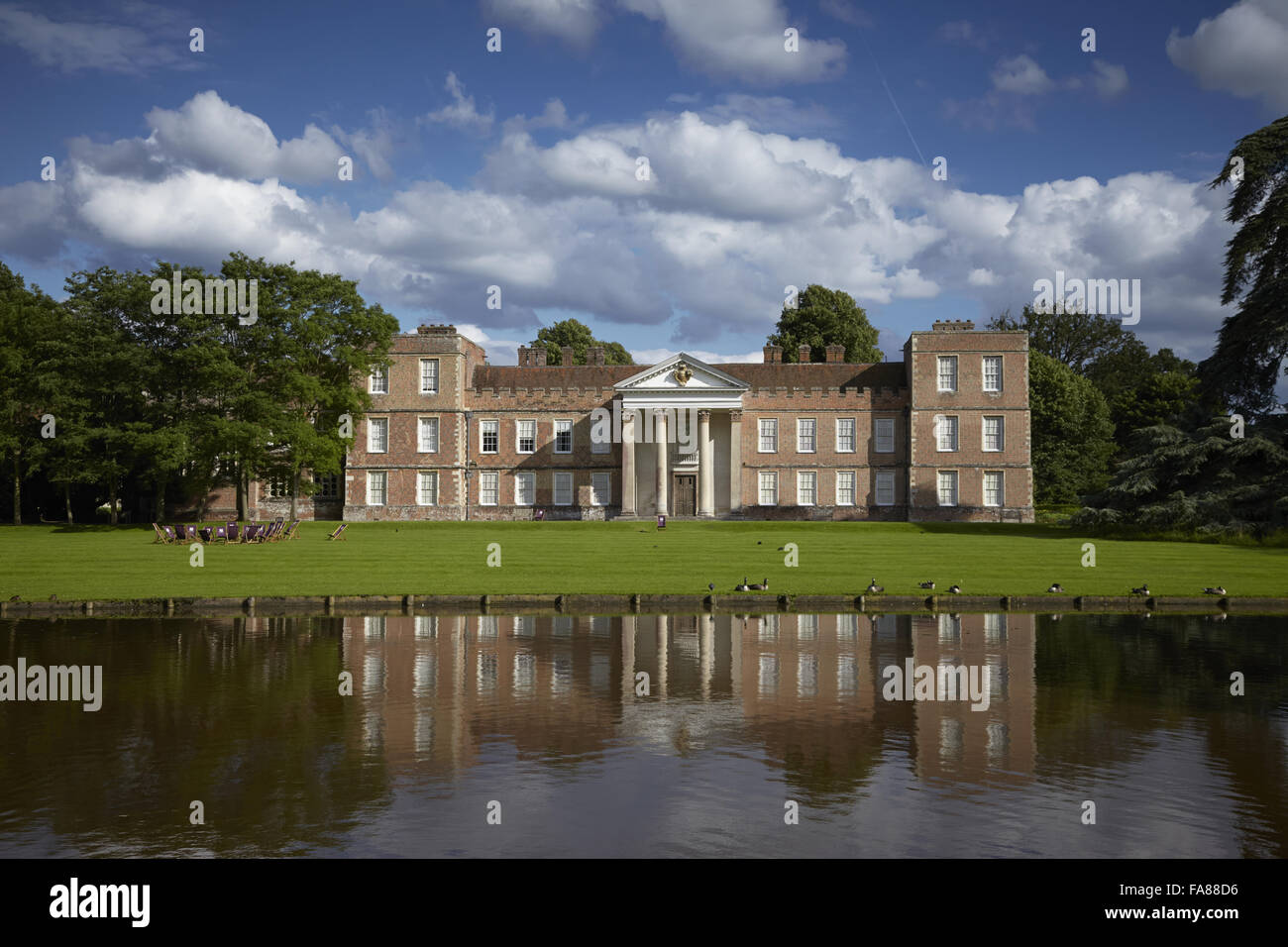 View of the north front of The Vyne and the lake. The house was built in the early 16th century for Lord Sandys, Henry VIII's Lord Chamberlain in 1526. Stock Photo