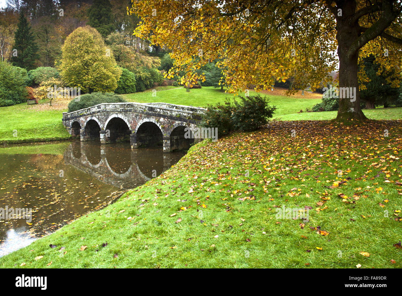 The Palladian Bridge in autumn at Stourhead, Wiltshire. Stock Photo