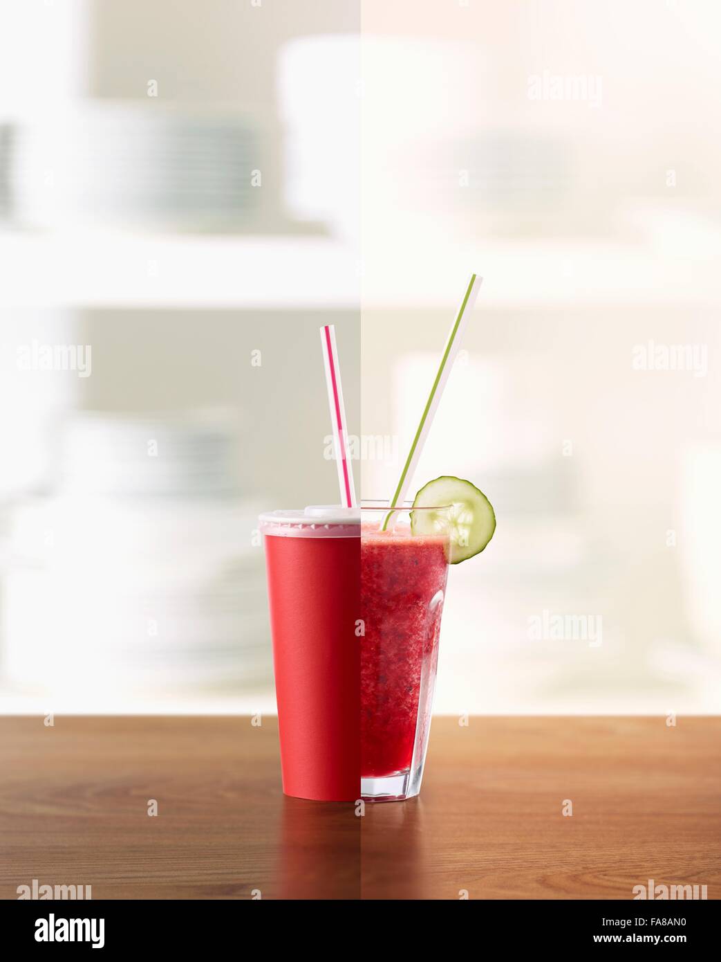 Half Raspberry, strawberry and blueberry smoothie, half soda drink ...