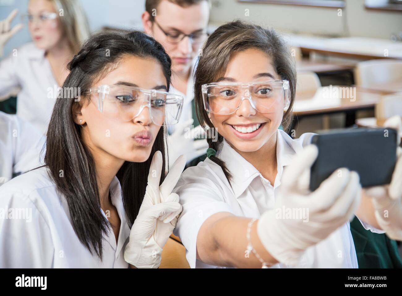 Students taking selfie in lab Stock Photo - Alamy