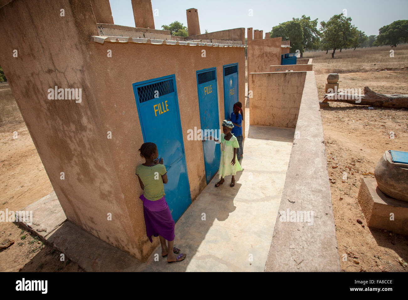 Girls use improved toilets at a primary school in Kouka Department, Burkina Faso, West Africa. Stock Photo