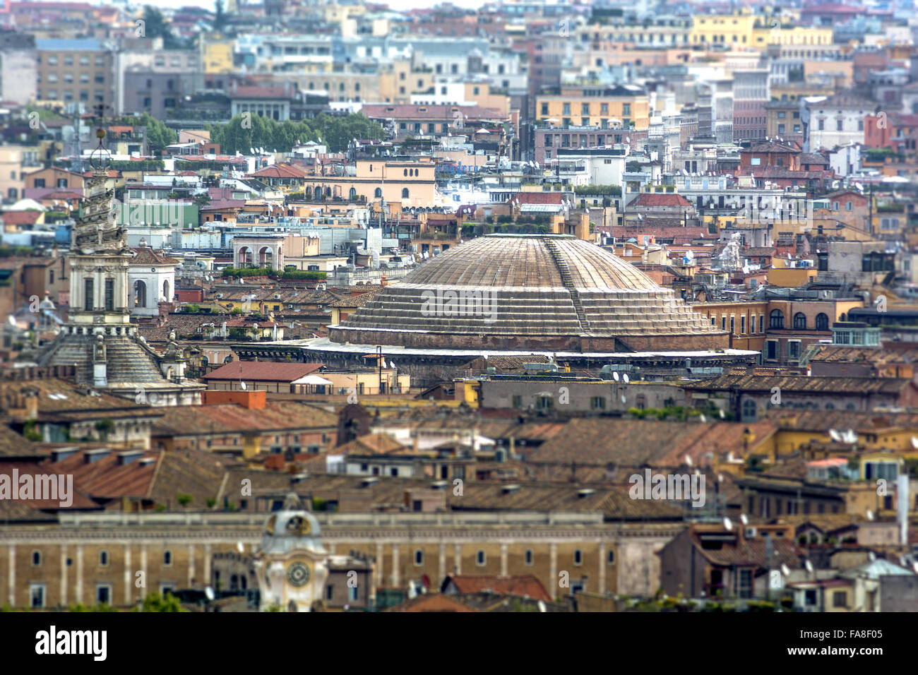 panoramic view on the roofs of Rome with the Pantheon dome in foreground Stock Photo