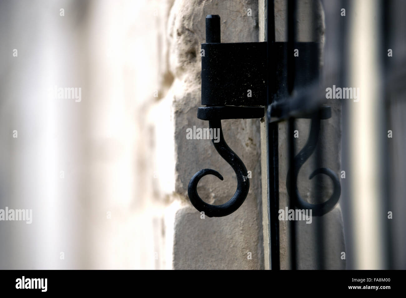 Metalwork detail nest to a window at the New Inn, Stowe, Buckinghamshire. Stock Photo