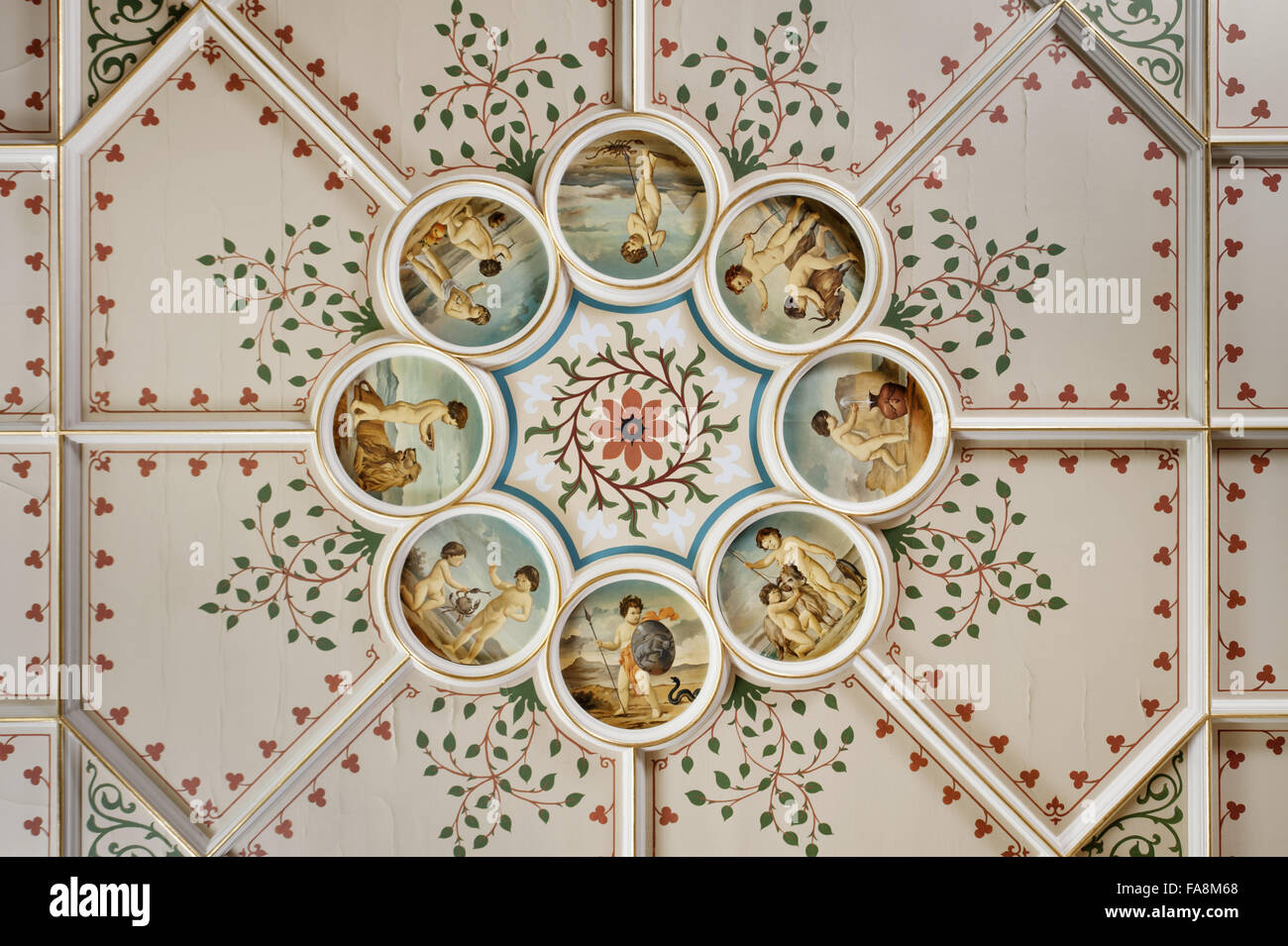 The Zodiac roundels on the ceiling in the Boudoir at Knightshayes Court, Devon. The roundels were repainted in 1981 by Ian Cairnie, the design was based closely on the scheme devised by John Dibblee Crace. Stock Photo