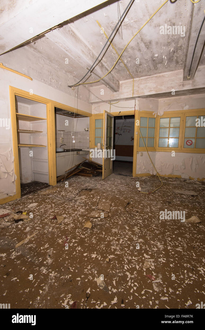 Room With Paint Peeling Off In Abandoned Building Stock