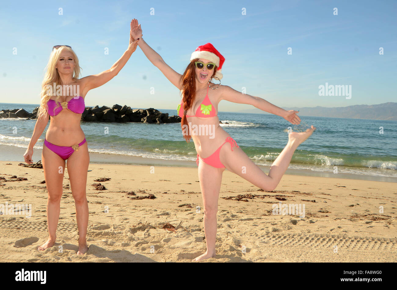Phoebe Price and new BFF (Best Friend Forever) Ana Braga pose together  during a photoshoot on Venice Beach Featuring: Phoebe Price, Ana Braga  Where: Venice, California, United States When: 18 Nov 2015