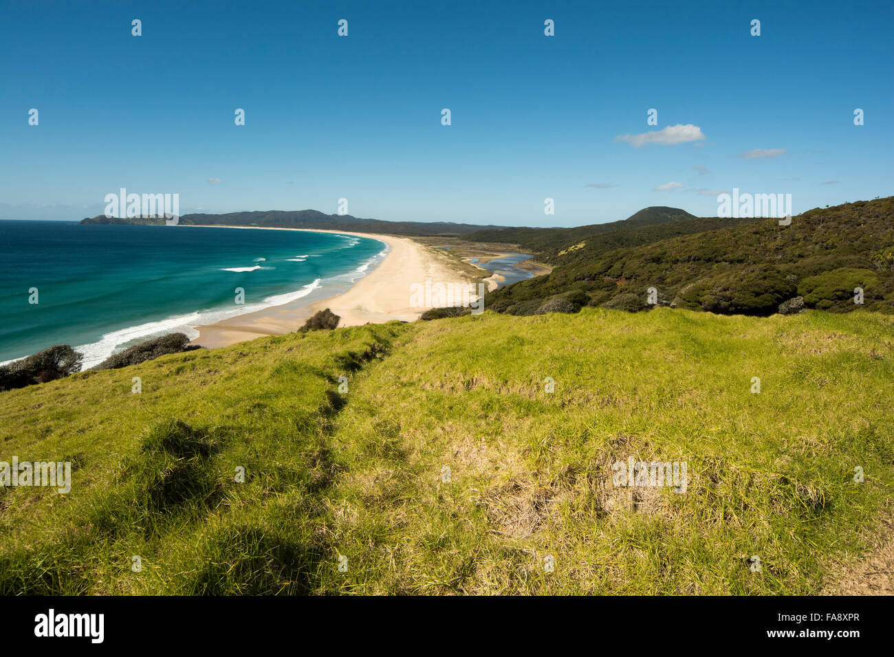 Waitahora Lagoon is just behind the twelve kilometer wide Spitirs Bay in the far north of New Zealand. Stock Photo