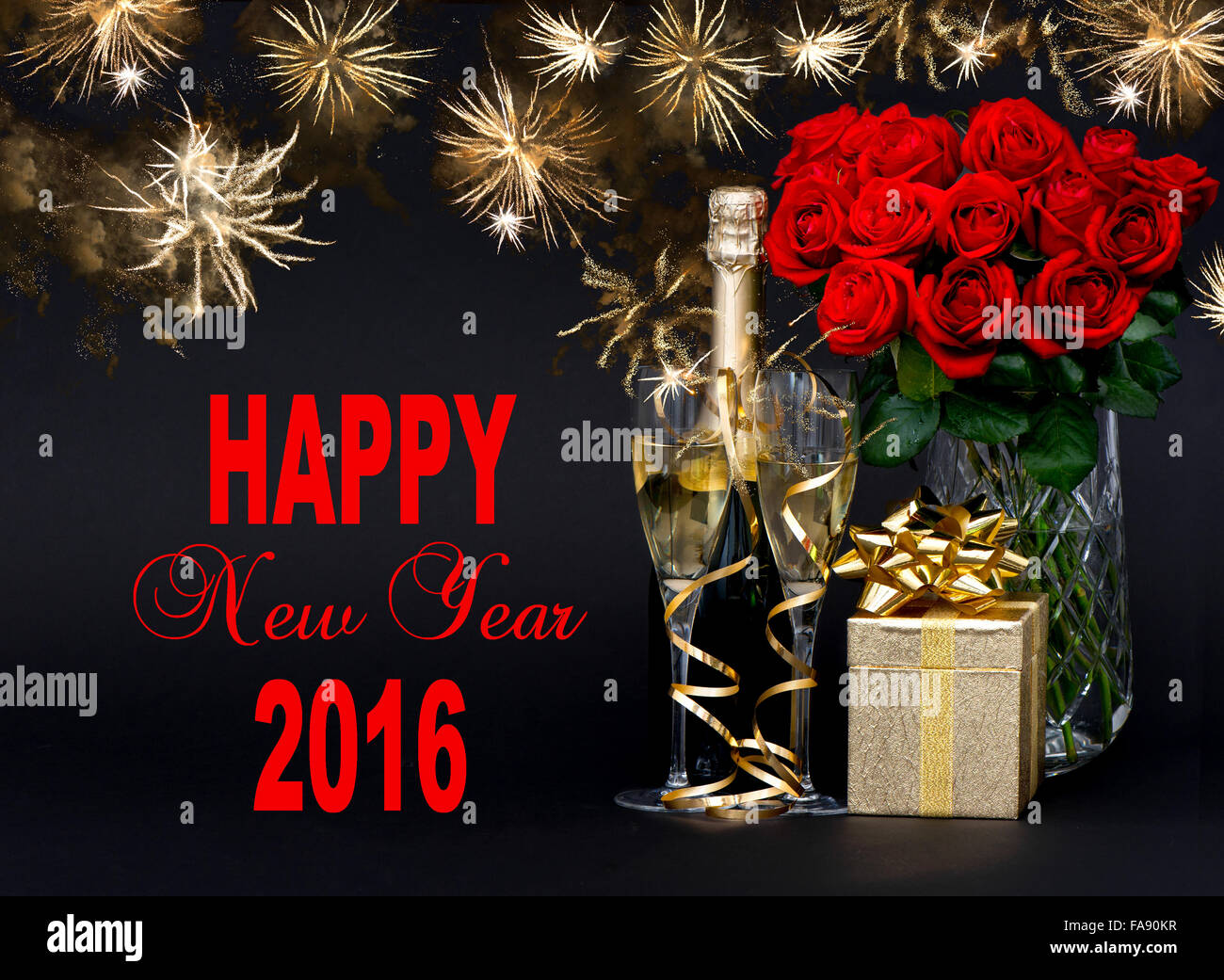 Happy New Year 2016! Greetings card concept. Red roses, bottle of champagne, golden gift. Golden fireworks on black background Stock Photo