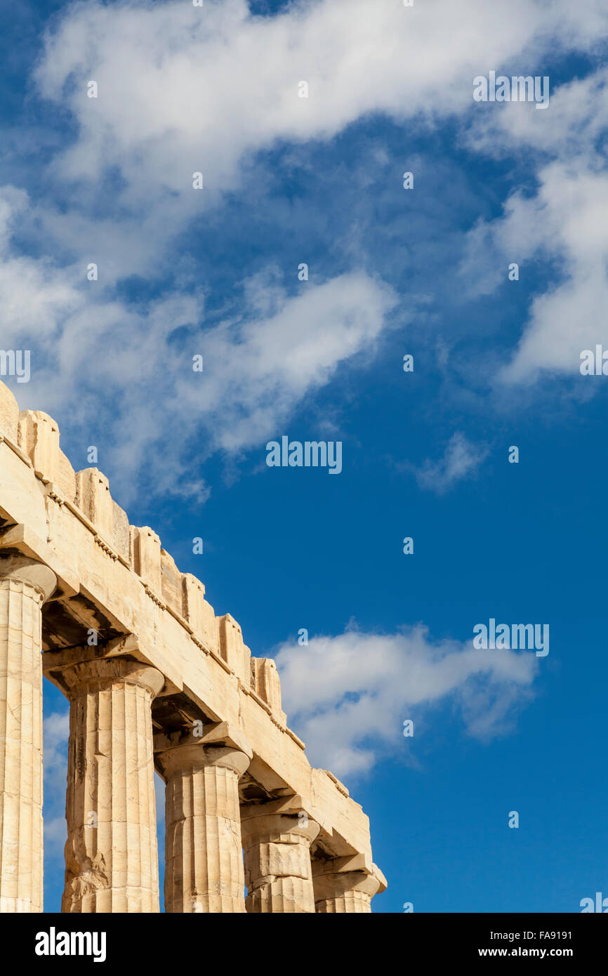 Stone and marble columns, part of the Acropolis of Athens, against the blue summer sky Stock Photo