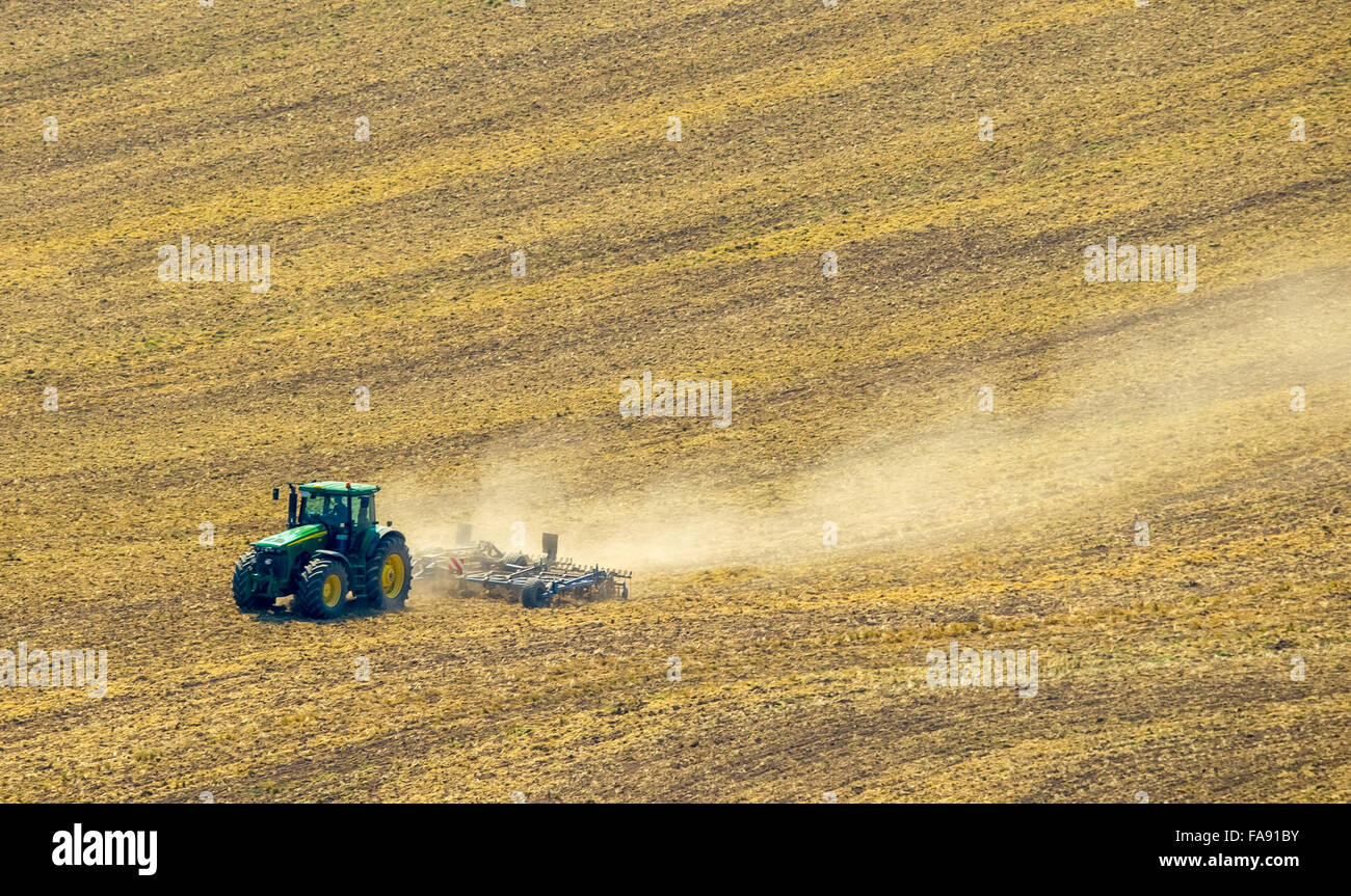Farmer harrowing his field, the tractor harrow, Meschede, Sauerland ...