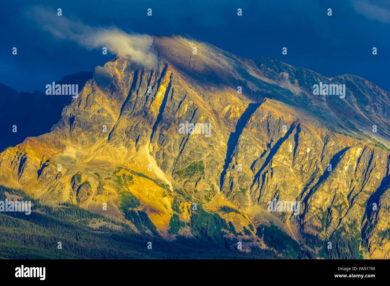 clearing storm on Mount Hardisty at sunset, Jasper National Park Stock