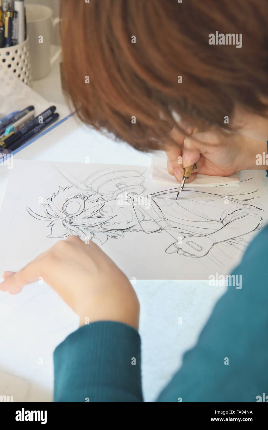 Japanese Manga artist working in the studio Stock Photo - Alamy