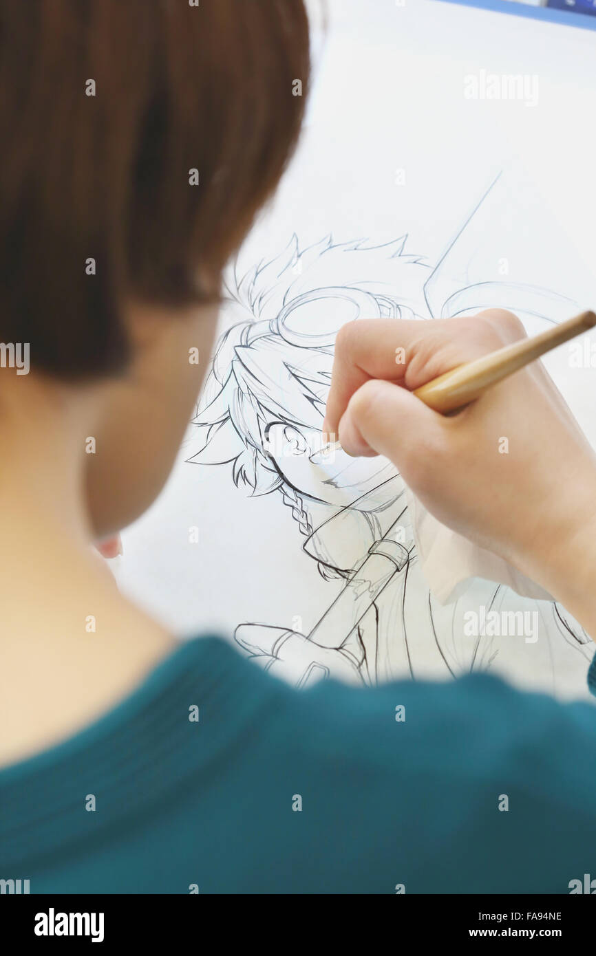 Japanese Manga artist working in the studio Stock Photo - Alamy