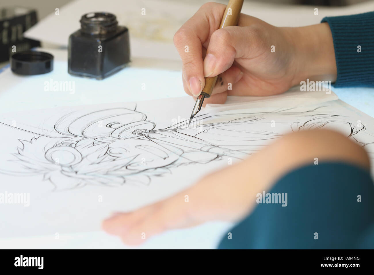 Japanese Manga artist working in the studio Stock Photo - Alamy