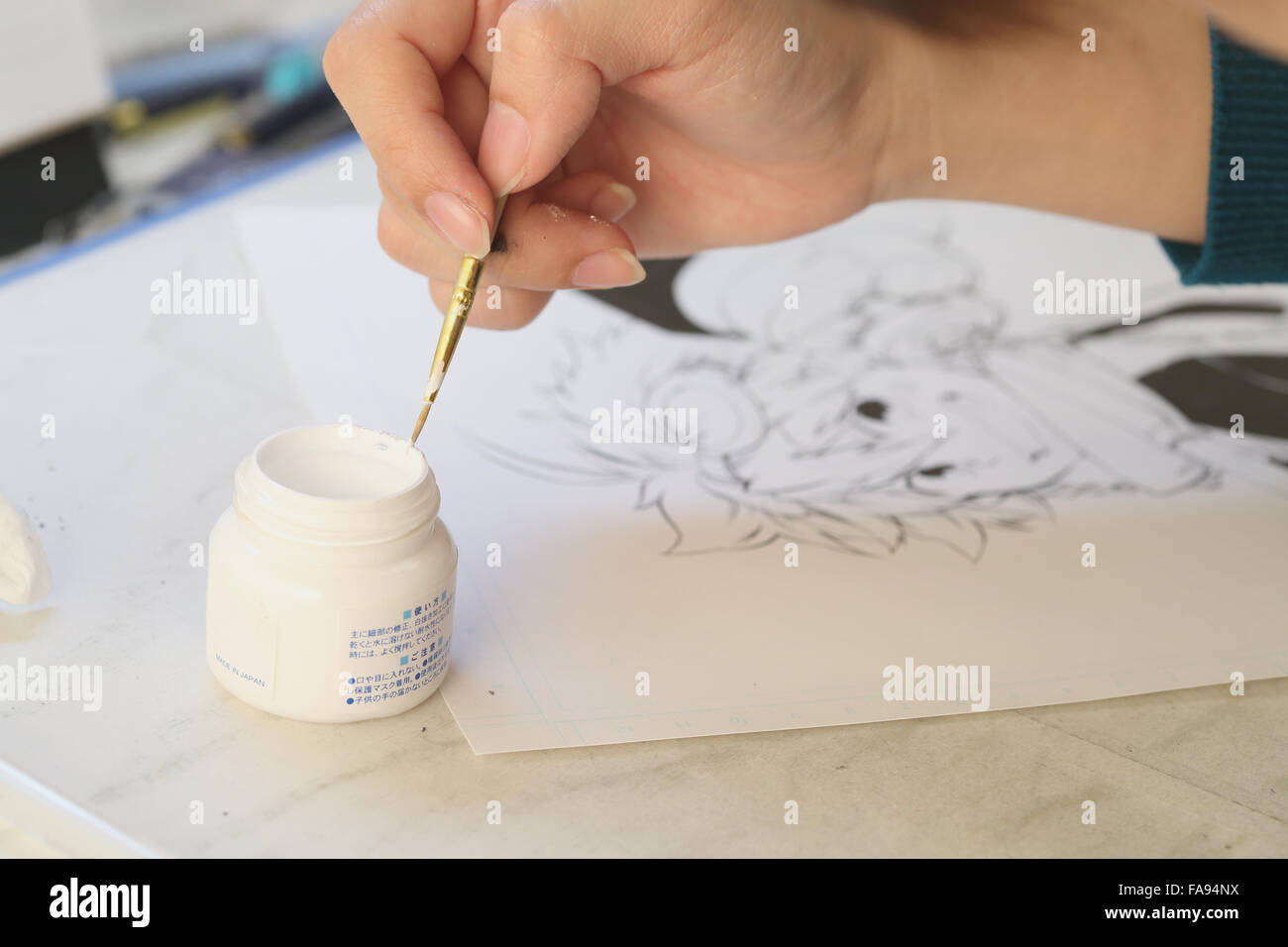 Japanese Manga artist working in the studio Stock Photo - Alamy