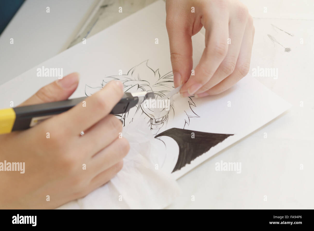Japanese Manga artist working in the studio Stock Photo - Alamy