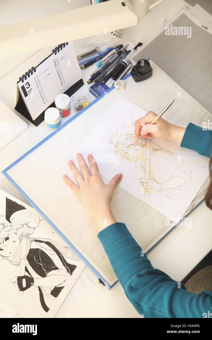 Japanese Manga artist working in the studio Stock Photo - Alamy