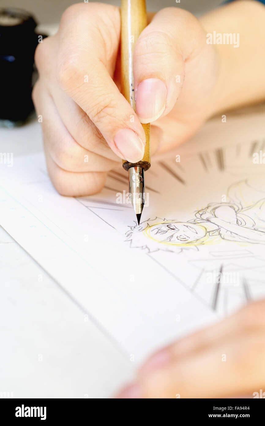 Japanese Manga artist working in the studio Stock Photo - Alamy