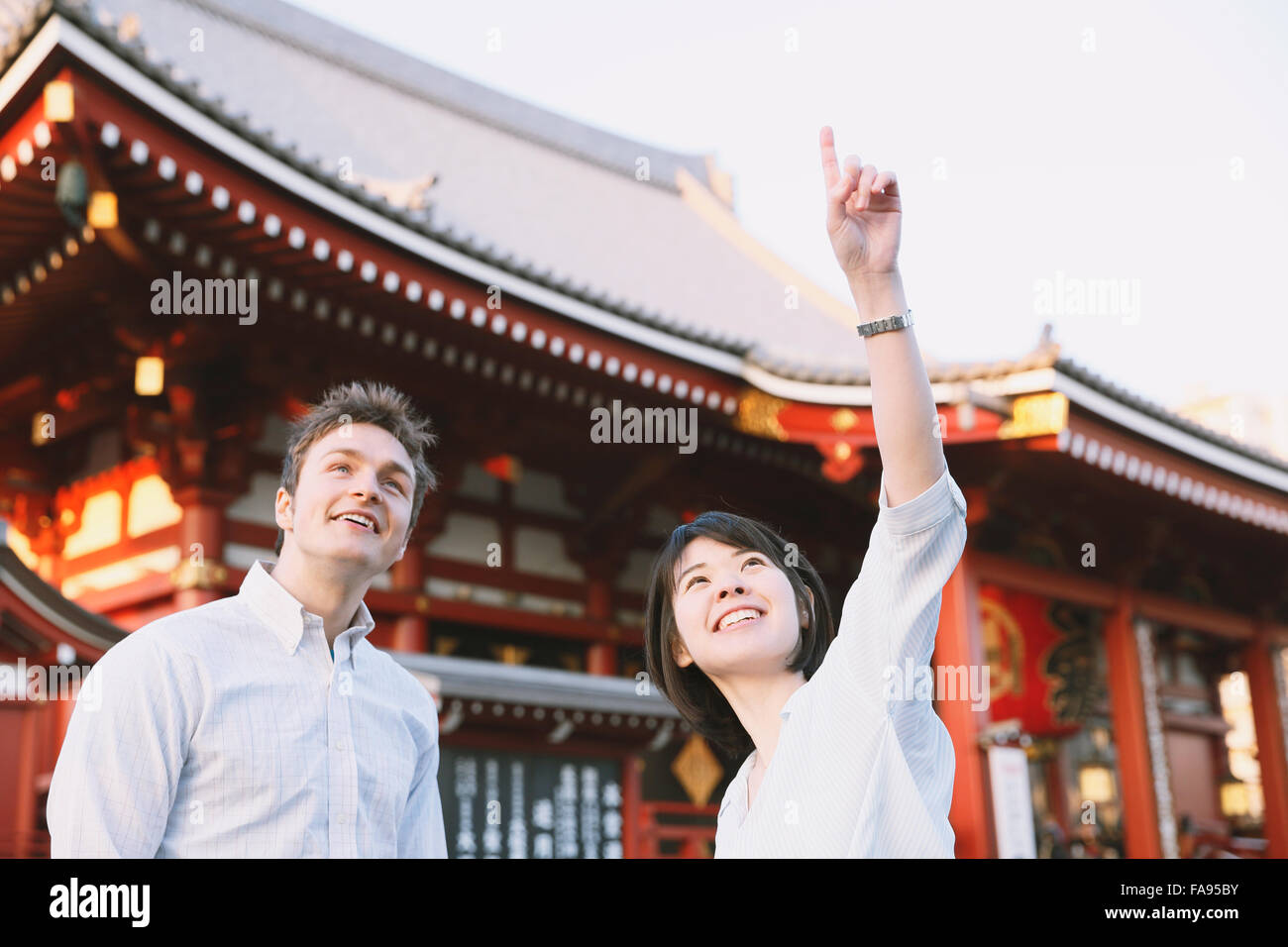 Young multi-ethnic couple enjoying tourism in Tokyo Stock Photo