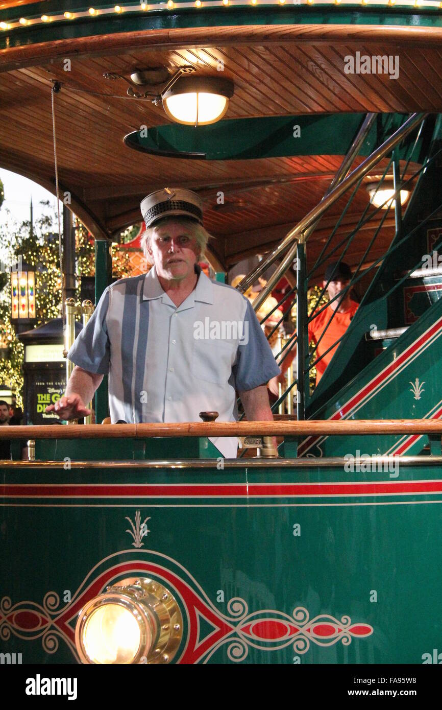 Gary Busey poses on a tram at The Grove with girlfriend Steffanie Sampson and their son Luke  Featuring: Gary Busey Where: Los Angeles, California, United States When: 22 Nov 2015 Stock Photo