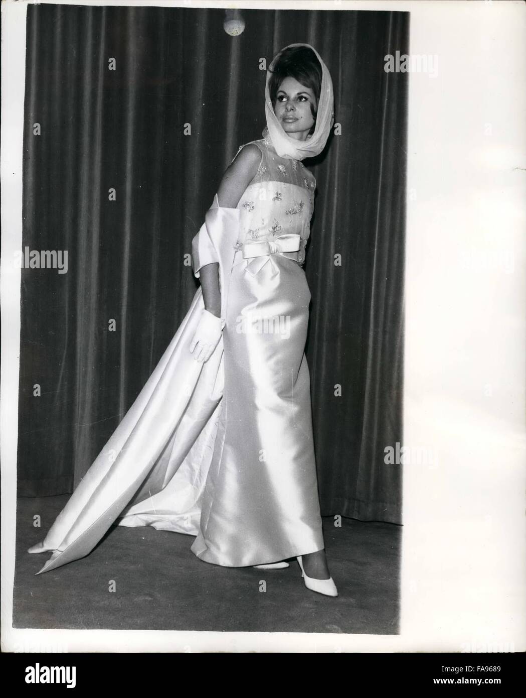 1962 - New styles from the Spring collection by Ronald Paterson. Black/  White check wool suit: ''Candice'' is the name given to this white heavy  embroided Evening Dress from the new Spring