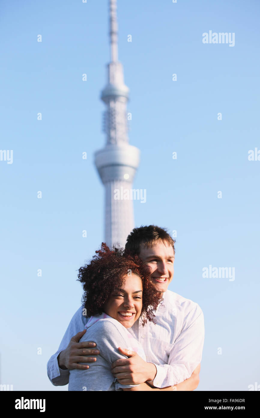 Multi-ethnic couple enjoying tourism in Tokyo Stock Photo