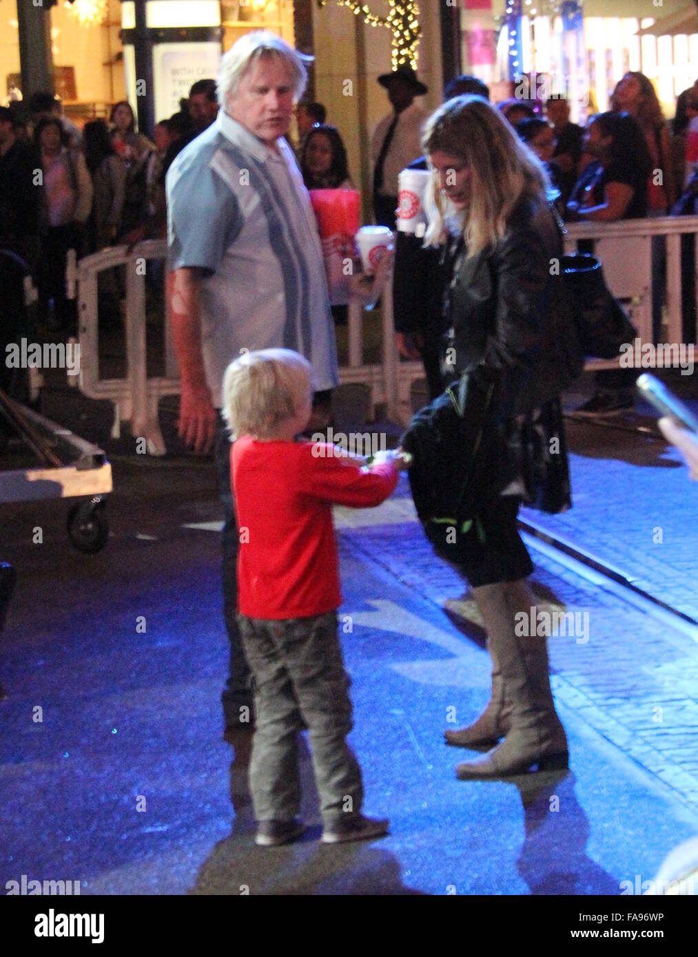 Gary Busey dances with his girlfriend Steffanie Sampson at The Grove  Featuring: Gary Busey, Steffanie Sampson, Luke Sampson Busey Where: Los Angeles, California, United States When: 22 Nov 2015 Stock Photo