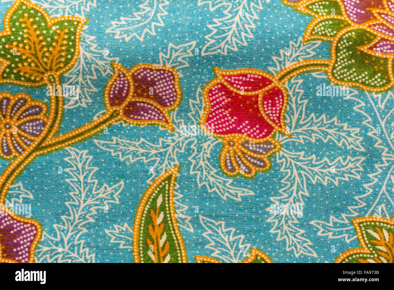 Background pattern with colorful flower of traditional general native Thai style texture fabric Stock Photo