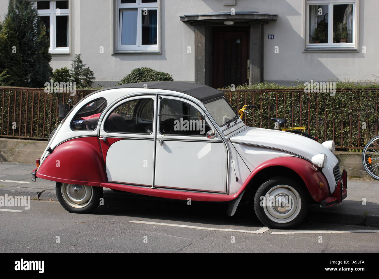 old French 2CV car is parking in a street in Bonn, Germany Stock Photo
