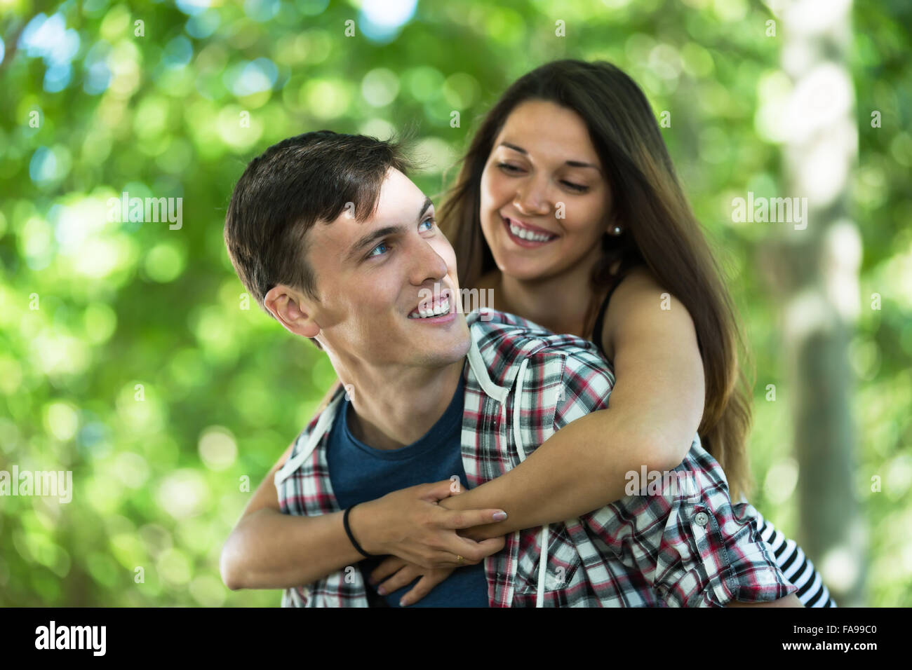 Couple in love having a date in park at summer day Stock Photo - Alamy