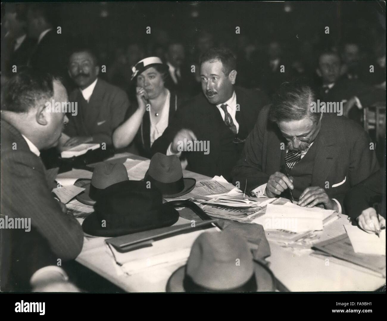 1945 - The men pictured above are at a Socialist Meeting in Paris at the  Palais de la Mutualite. Pierre Cardin Leather Dress, Turtleneck, Hose, &  Booties © Keystone Pictures USA/ZUMAPRESS.com/Alamy Live