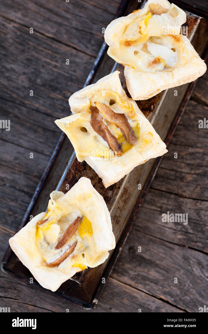 Mini tarts with pears and blue cheese Stock Photo Alamy
