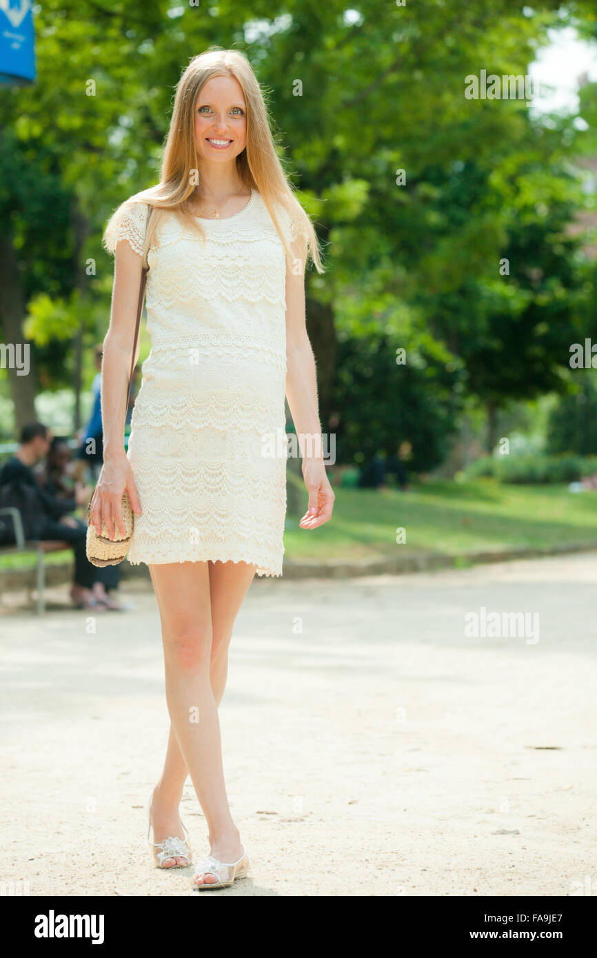 Portrait of pregnant woman walks in summer park Stock Photo - Alamy