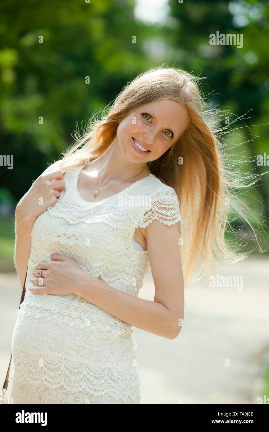Portrait of pregnant woman walks in summer park Stock Photo - Alamy