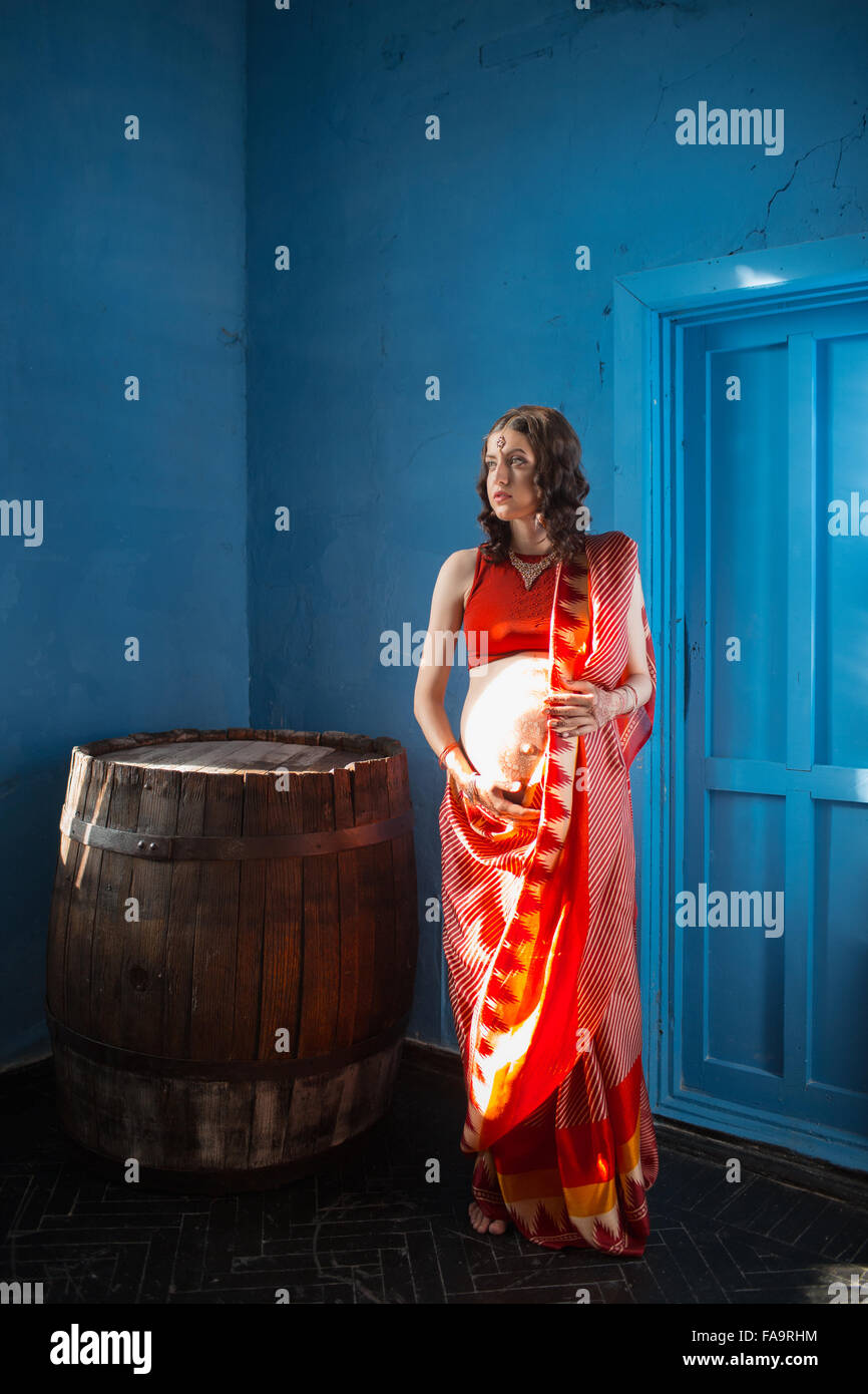 The pregnant woman with henna tattoo Stock Photo Alamy