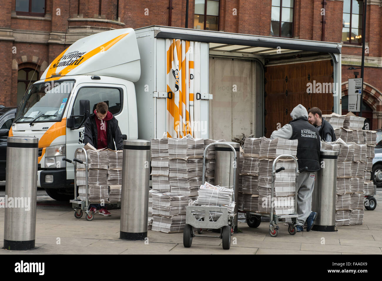 Van delivery of Evening Standard newspapers in London outside Kings Cross station Stock Photo