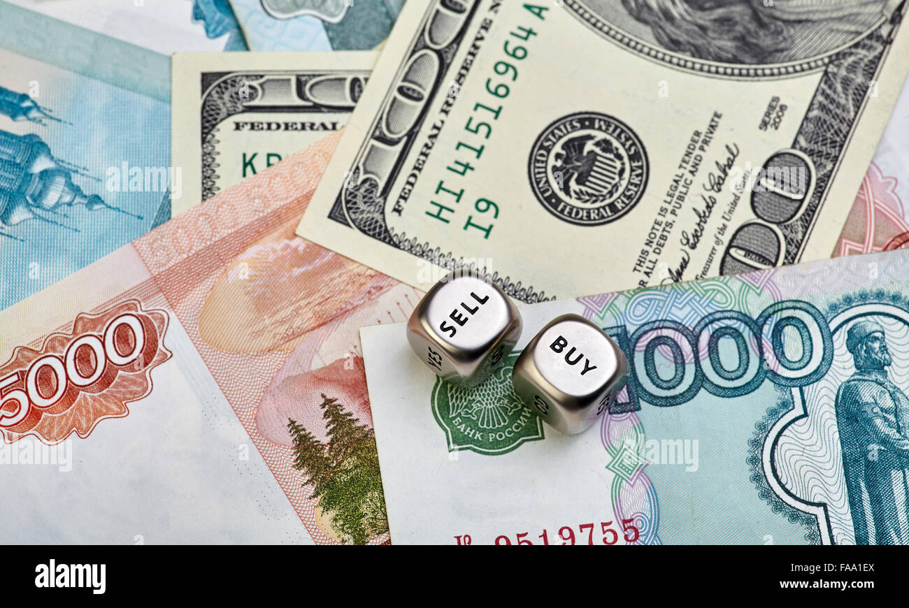 Russian Ruble, US Dollar and dices cubes. Selective focus Stock Photo