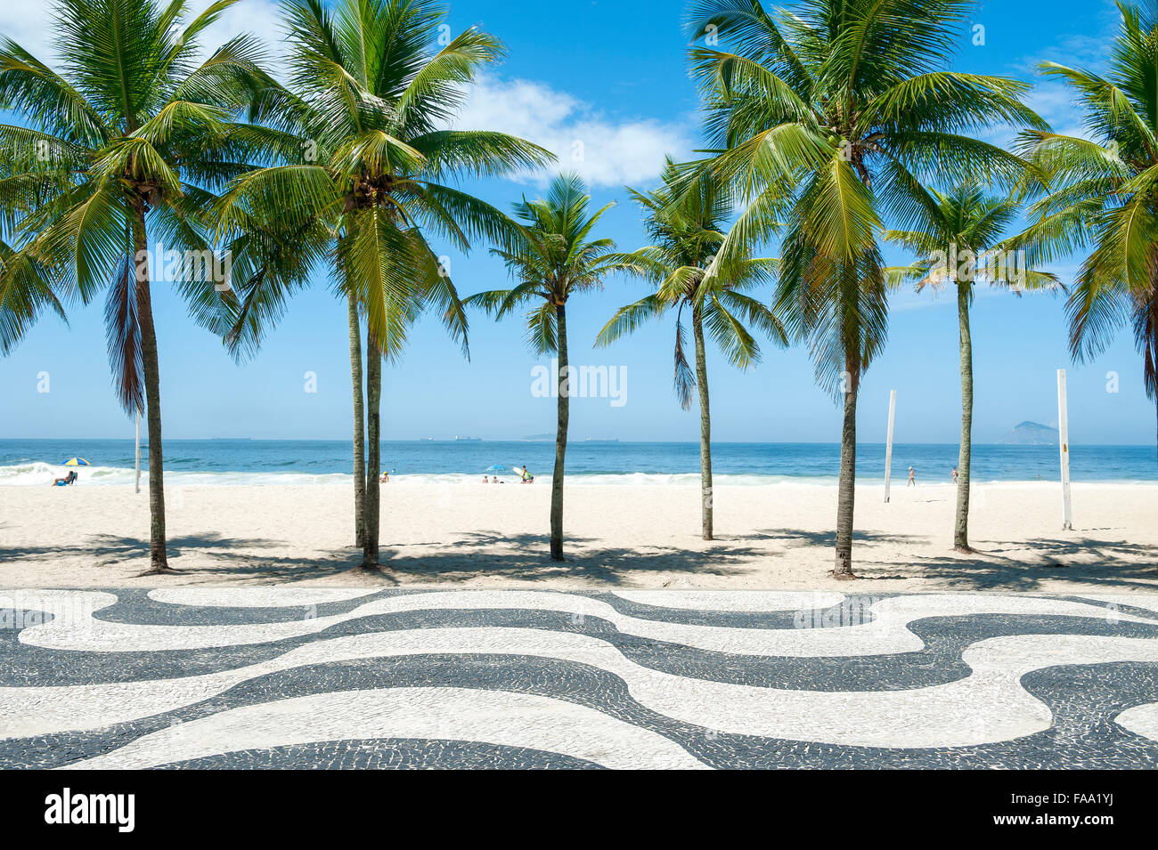 Iconic sidewalk tile pattern with palm trees at Copacabana Beach in Rio
