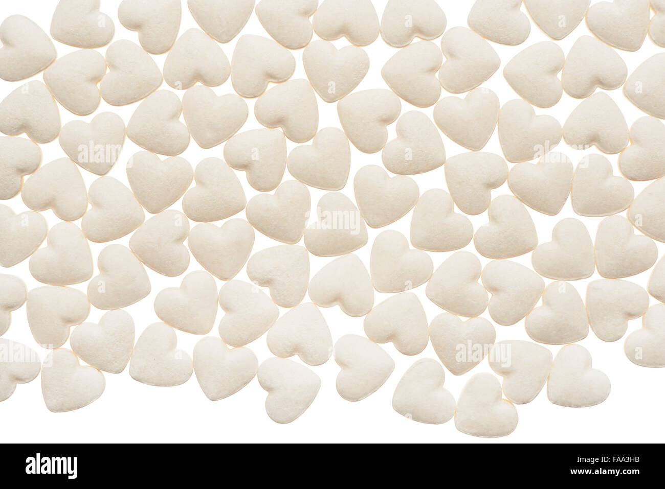 White heart shape tablets isolated on white background Stock Photo