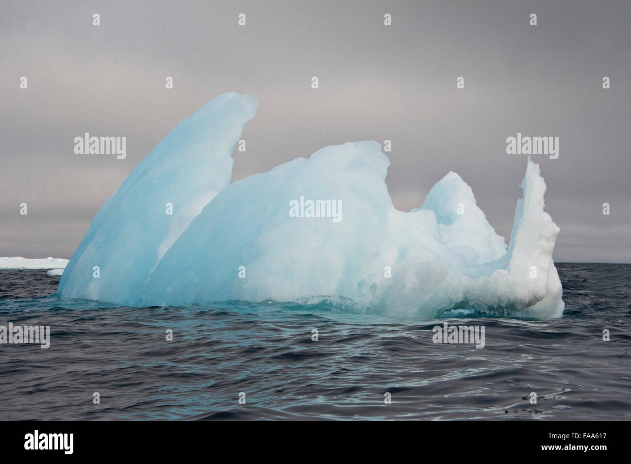 Unusually shaped iceberg, Baffin Island, Canadian Arctic Stock Photo
