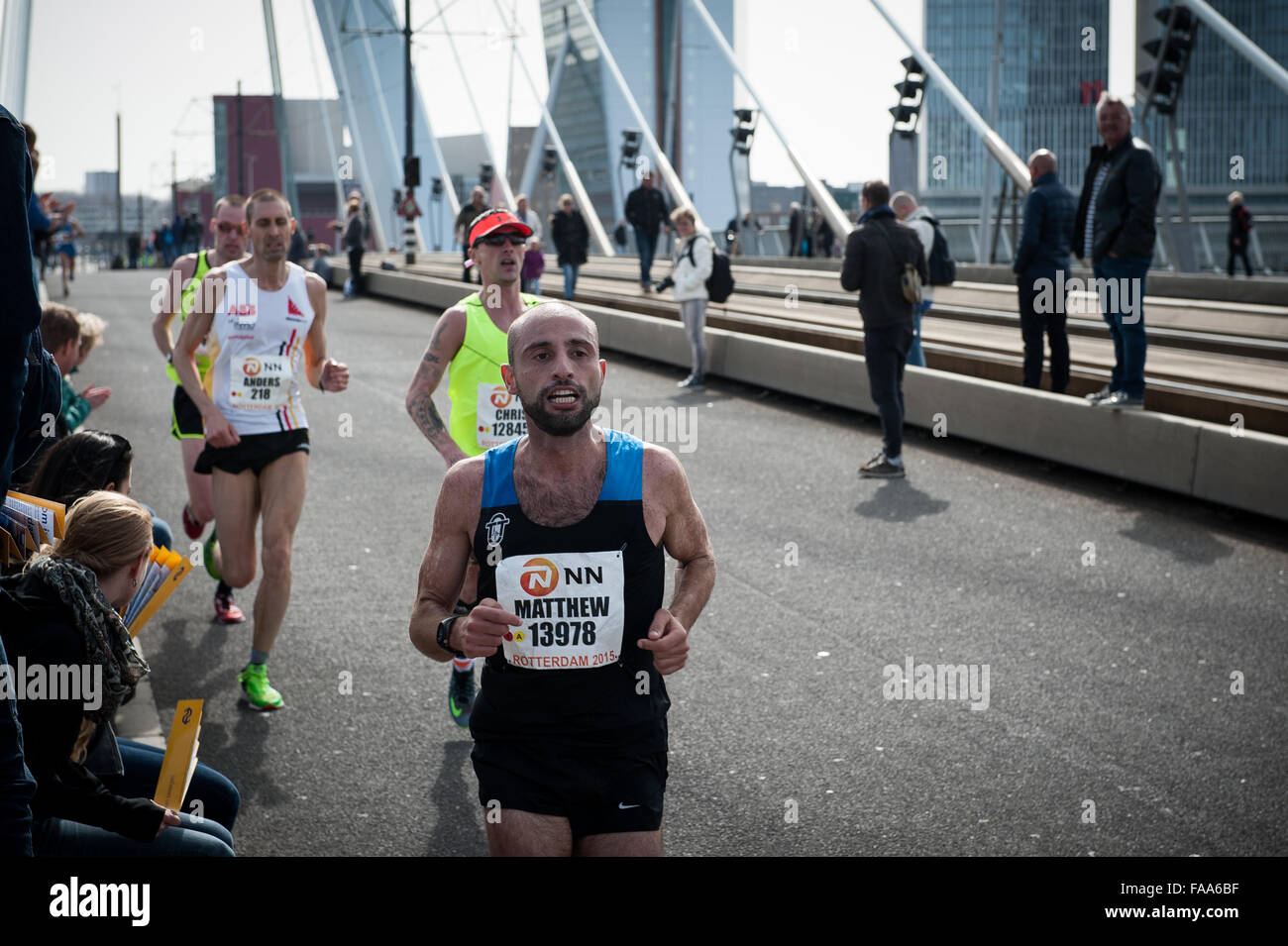 Rotterdam, The Netherlands. 04th Apr, 2015. Participants run on the Erasmus bridge during the